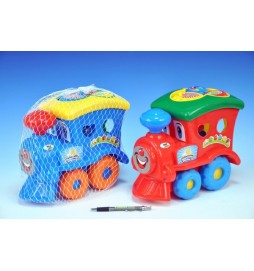 Lokomotiva vkládací veselá plast 27x24cm