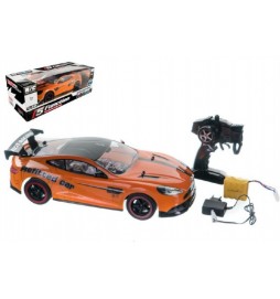 Auto RC oranžové zrychlující plast 40cm 27MHz na baterie + dobíjecí pack v krabici 56x20x24cm