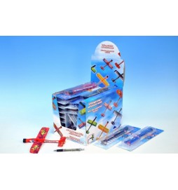 Letadlo pěna/plast vystřelovací na gumu 23cm, 4 různé barvy - 1 kus