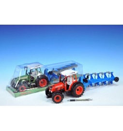 Traktor s pluhem plast 49cm na setrvačník; 2 barvy; v krabičce - 1 kus