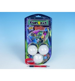 Žonglérské míčky Funtrix + DVD průměr 6,7cm na baterie 3xLR44 se světlem na kartě